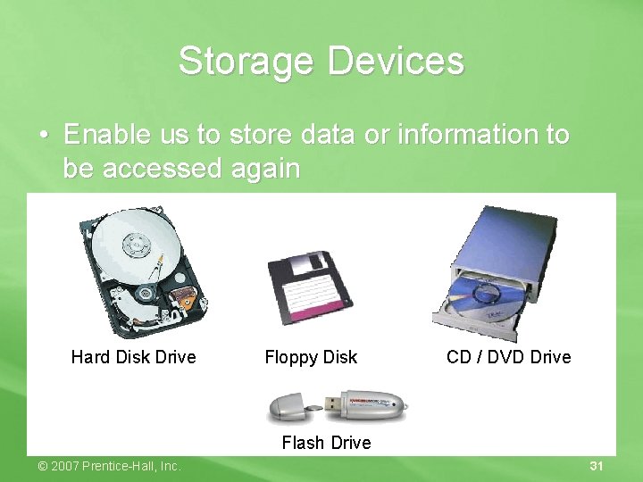 Storage Devices • Enable us to store data or information to be accessed again