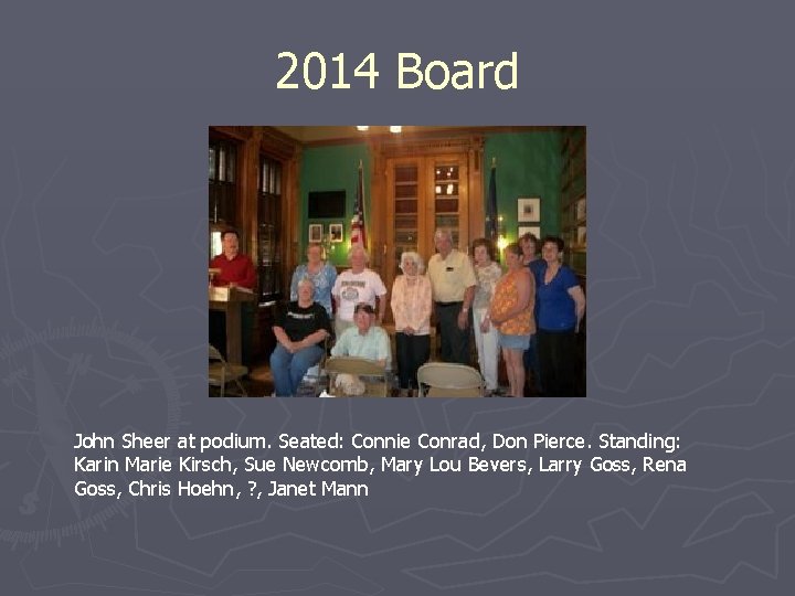 2014 Board John Sheer at podium. Seated: Connie Conrad, Don Pierce. Standing: Karin Marie