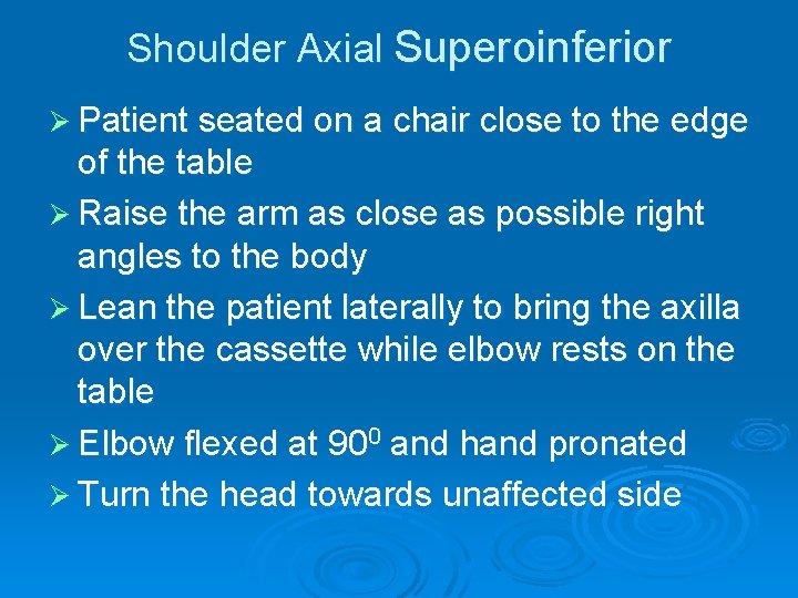 Shoulder Axial Superoinferior Ø Patient seated on a chair close to the edge of