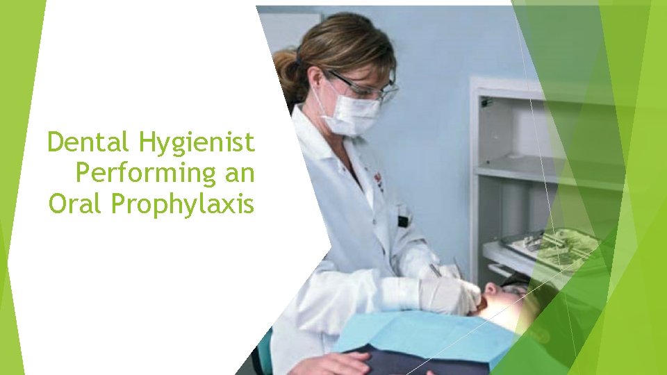 Dental Hygienist Performing an Oral Prophylaxis 