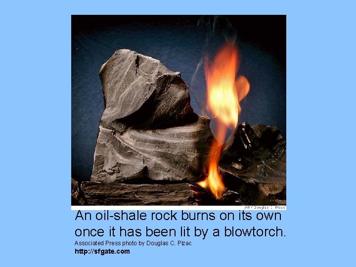 An oil-shale rock burns on its own once it has been lit by a