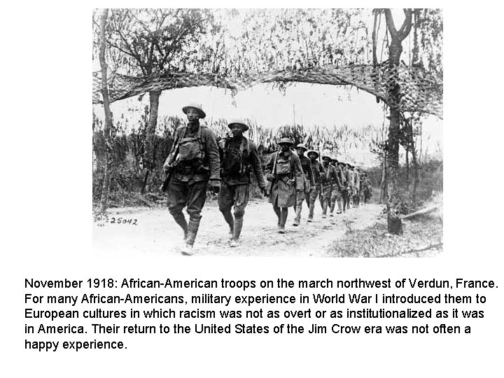 November 1918: African-American troops on the march northwest of Verdun, France. For many African-Americans,