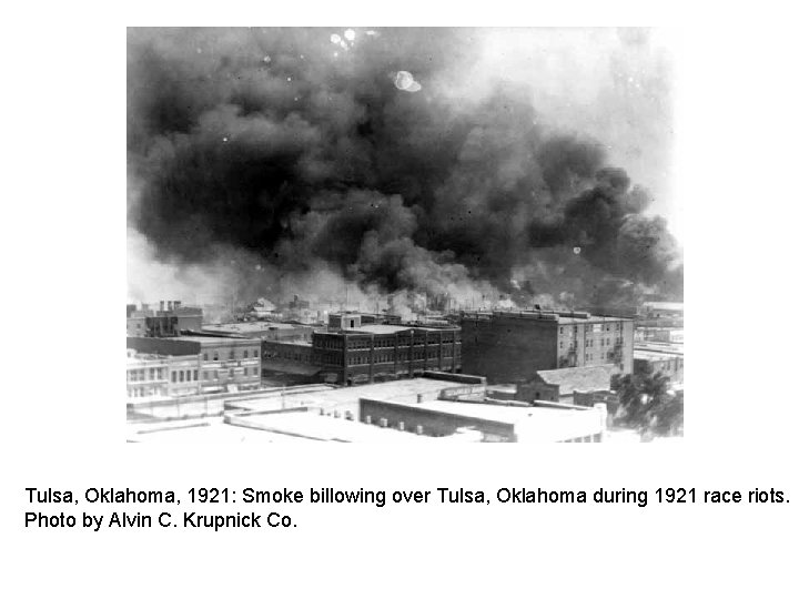 Tulsa, Oklahoma, 1921: Smoke billowing over Tulsa, Oklahoma during 1921 race riots. Photo by