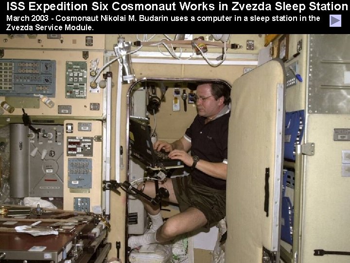 ISS Expedition Six Cosmonaut Works in Zvezda Sleep Station March 2003 - Cosmonaut Nikolai