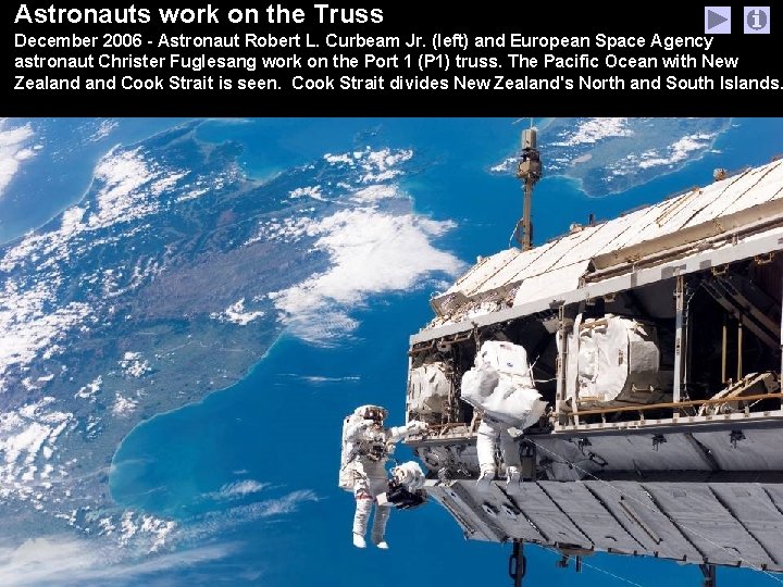 Astronauts work on the Truss December 2006 - Astronaut Robert L. Curbeam Jr. (left)