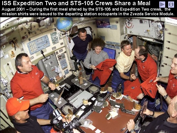 ISS Expedition Two and STS-105 Crews Share a Meal August 2001 – During the