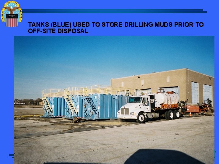 TANKS (BLUE) USED TO STORE DRILLING MUDS PRIOR TO OFF-SITE DISPOSAL 
