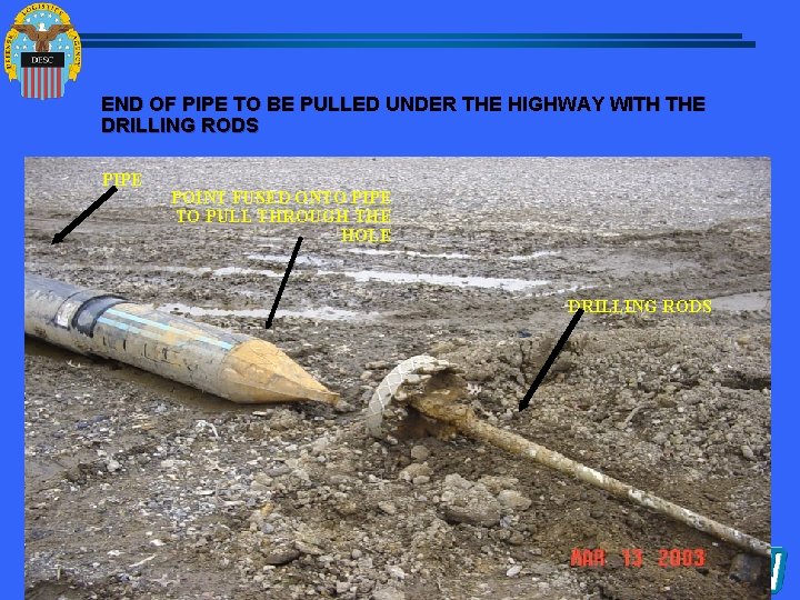 END OF PIPE TO BE PULLED UNDER THE HIGHWAY WITH THE DRILLING RODS PIPE