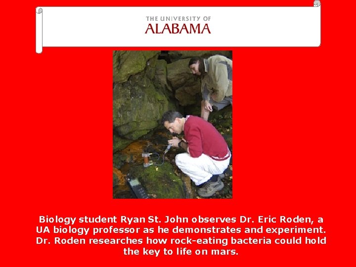 Biology student Ryan St. John observes Dr. Eric Roden, a UA biology professor as