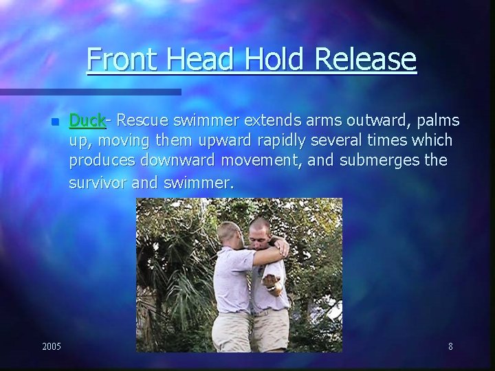 Front Head Hold Release n 2005 Duck- Rescue swimmer extends arms outward, palms up,