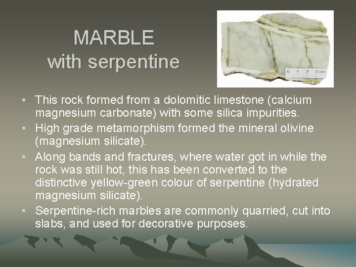 MARBLE with serpentine • This rock formed from a dolomitic limestone (calcium magnesium carbonate)