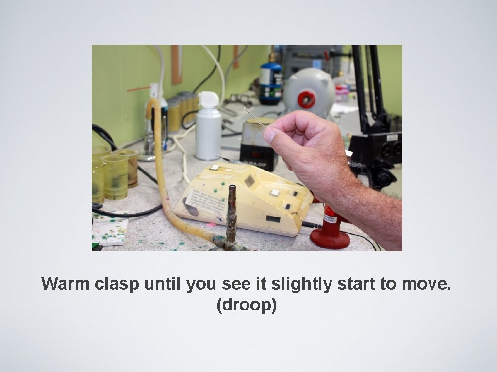 Warm clasp until you see it slightly start to move. (droop) 