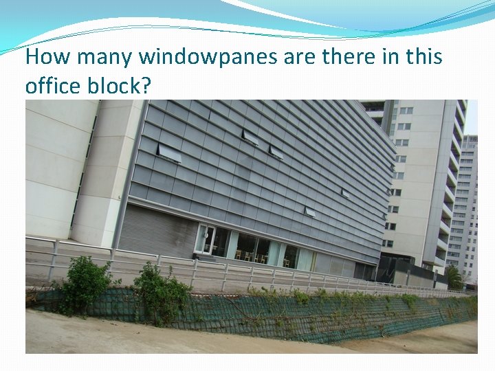 How many windowpanes are there in this office block? 