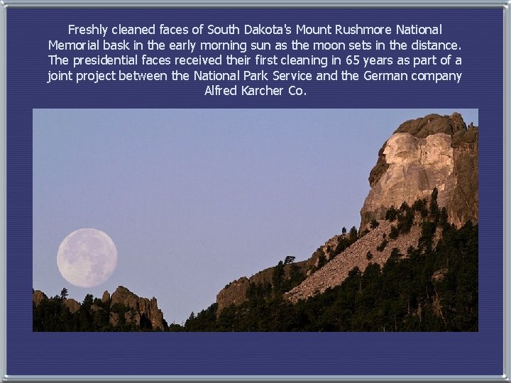 Freshly cleaned faces of South Dakota's Mount Rushmore National Memorial bask in the early