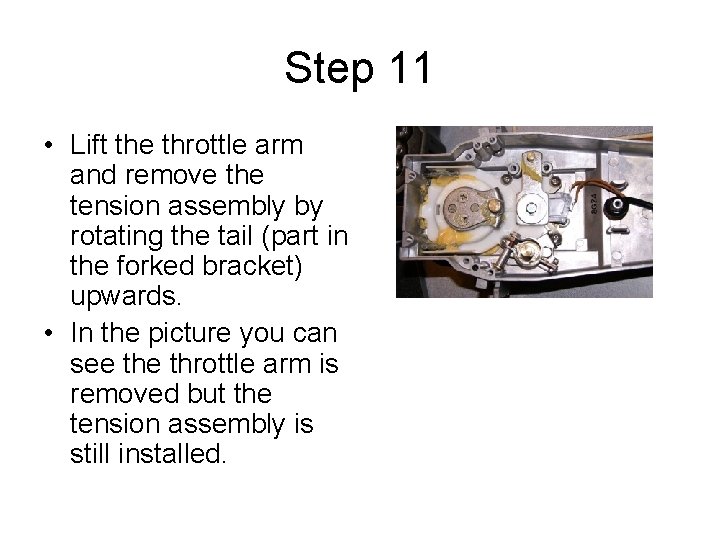 Step 11 • Lift the throttle arm and remove the tension assembly by rotating