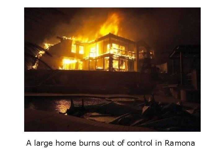 A large home burns out of control in Ramona 