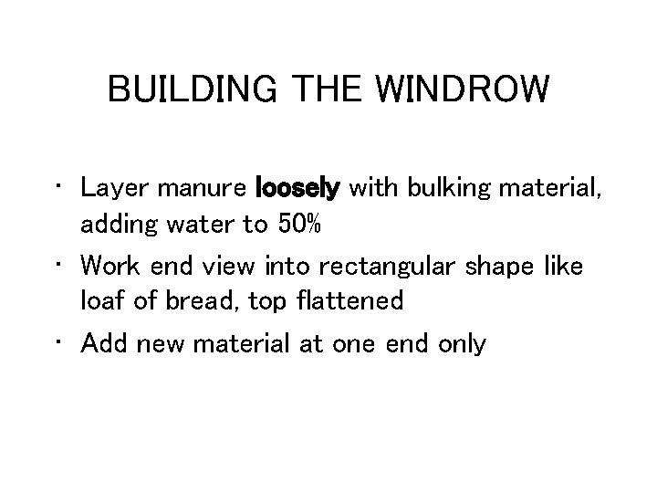 BUILDING THE WINDROW • Layer manure loosely with bulking material, adding water to 50%