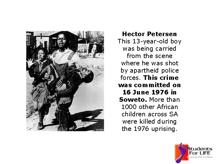 Hector Petersen This 13 -year-old boy was being carried from the scene where he