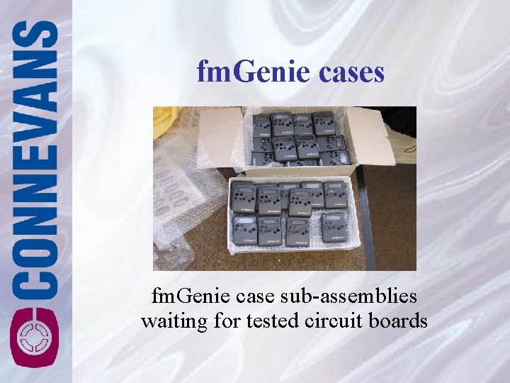 fm. Genie cases fm. Genie case sub-assemblies waiting for tested circuit boards fm. Genie cases fm. Genie case sub-assemblies waiting for tested circuit boards