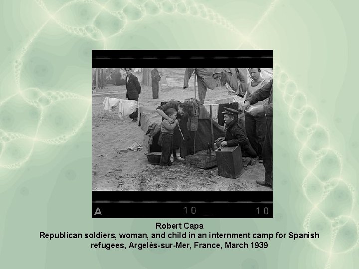 Robert Capa Republican soldiers, woman, and child in an internment camp for Spanish refugees,