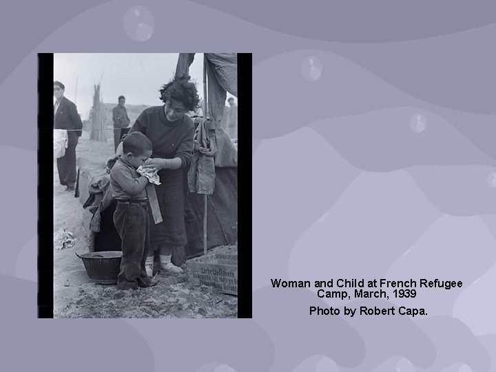 Woman and Child at French Refugee Camp, March, 1939 Photo by Robert Capa. 
