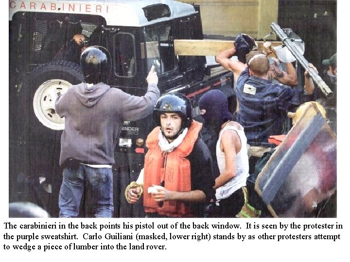 The carabinieri in the back points his pistol out of the back window. It