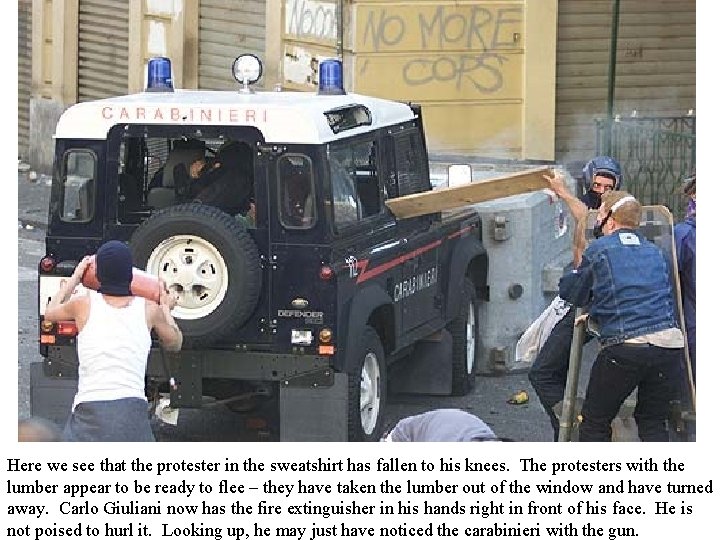 Here we see that the protester in the sweatshirt has fallen to his knees.