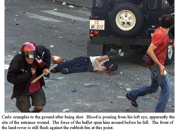 Carlo crumples to the ground after being shot. Blood is pouring from his left