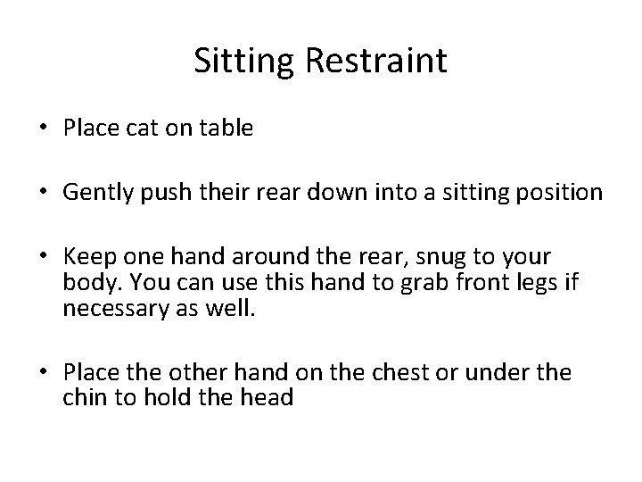 Sitting Restraint • Place cat on table • Gently push their rear down into