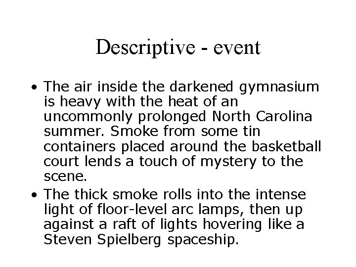 Descriptive - event • The air inside the darkened gymnasium is heavy with the