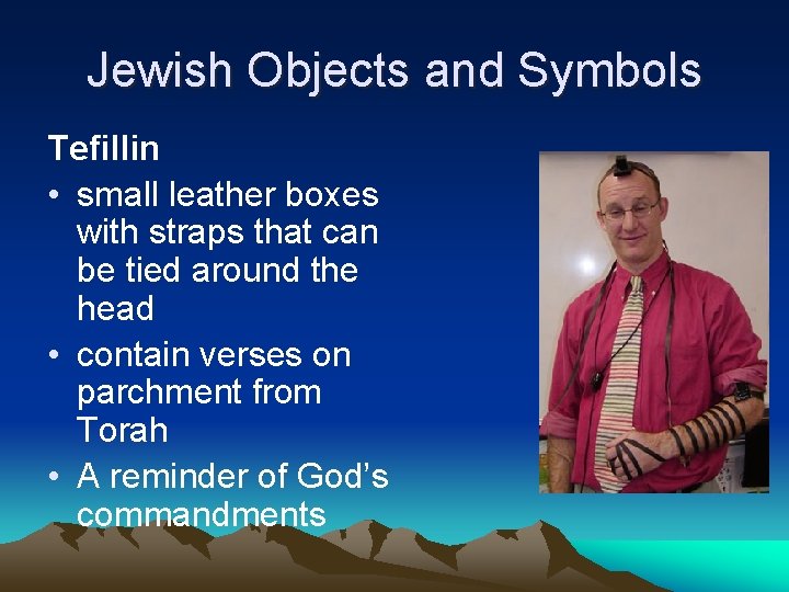 Jewish Objects and Symbols Tefillin • small leather boxes with straps that can be