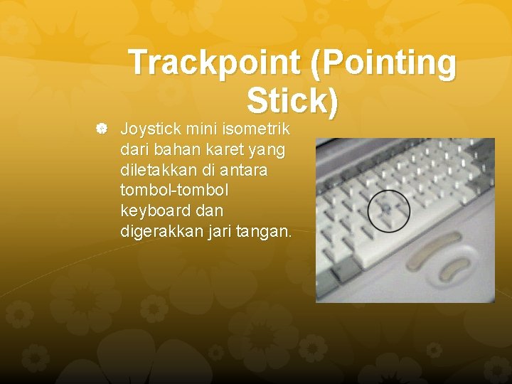 Trackpoint (Pointing Stick) Joystick mini isometrik dari bahan karet yang diletakkan di antara tombol-tombol