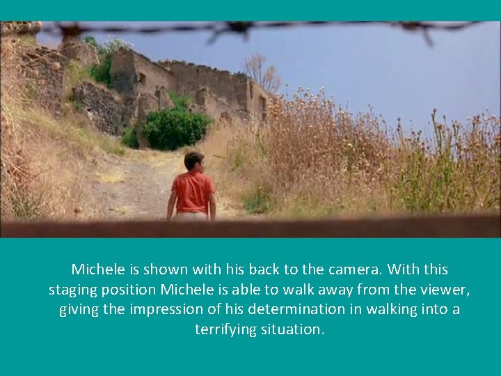  Michele is shown with his back to the camera. With this staging position