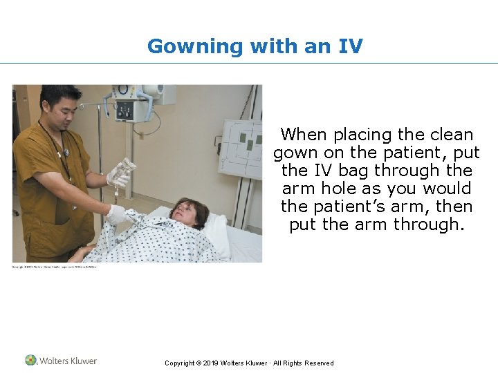Gowning with an IV When placing the clean gown on the patient, put the