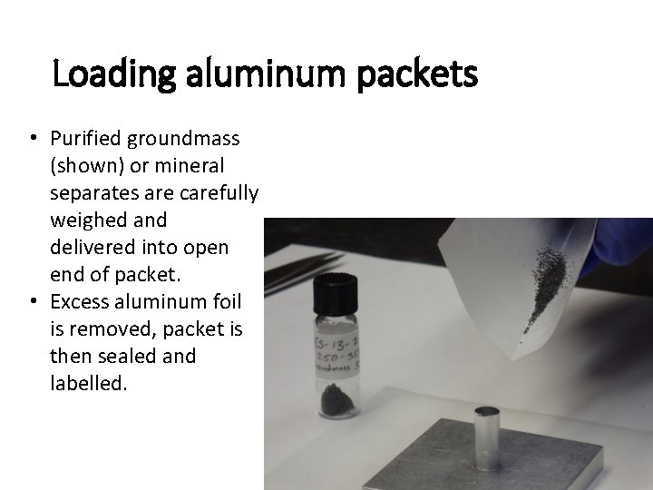 Loading aluminum packets • Purified groundmass (shown) or mineral separates are carefully weighed and