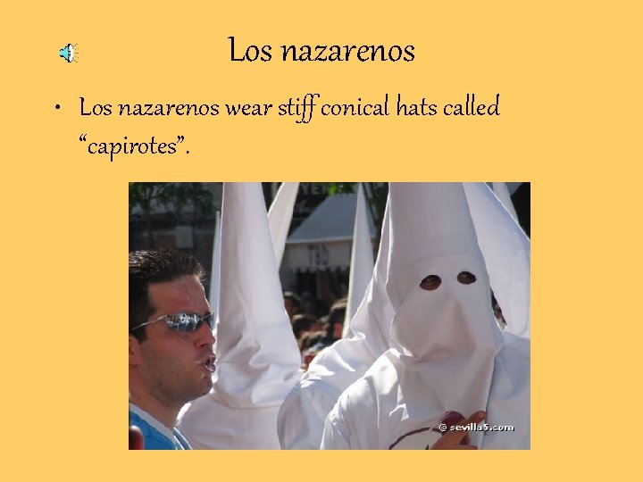 Los nazarenos • Los nazarenos wear stiff conical hats called “capirotes”. Los nazarenos • Los nazarenos wear stiff conical hats called “capirotes”.