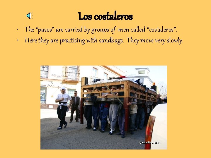 Los costaleros • The “pasos” are carried by groups of men called “costaleros”. • Los costaleros • The “pasos” are carried by groups of men called “costaleros”. •