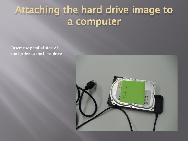 Attaching the hard drive image to a computer Insert the parallel side of the