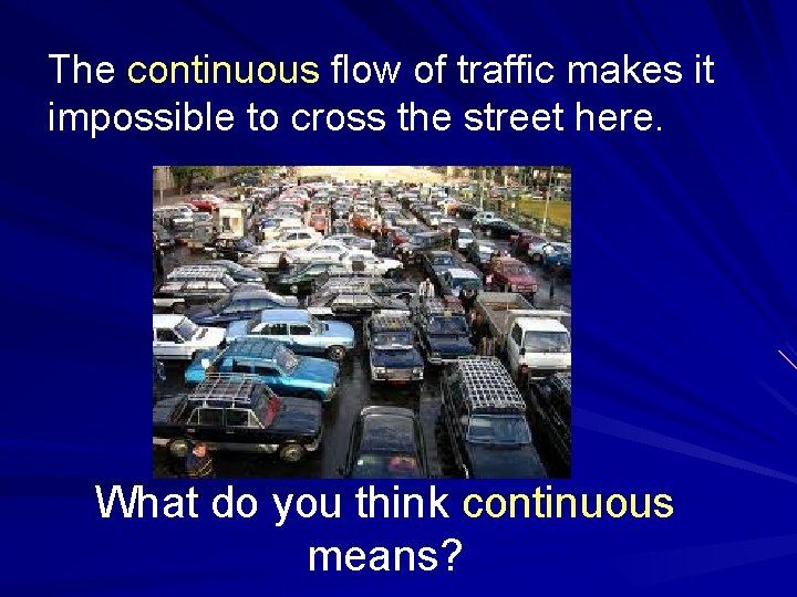 The continuous flow of traffic makes it impossible to cross the street here. What