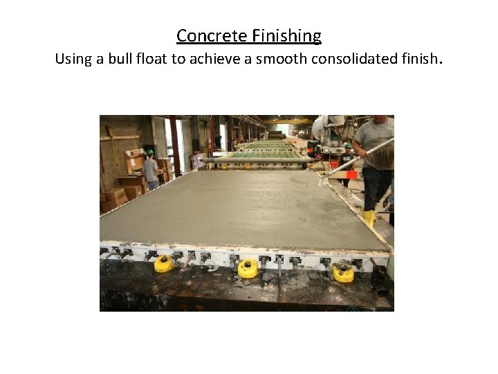 Concrete Finishing Using a bull float to achieve a smooth consolidated finish. 