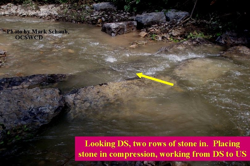 Photo by Mark Schaub, OCSWCD Looking DS, two rows of stone in. Placing stone