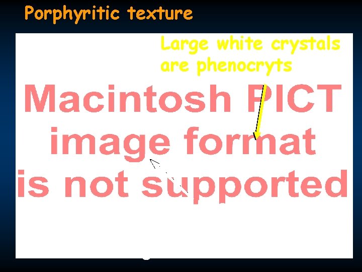 Porphyritic texture Large white crystals are phenocryts Aphanitic basalt (mafic composition) constitutes the groundmass