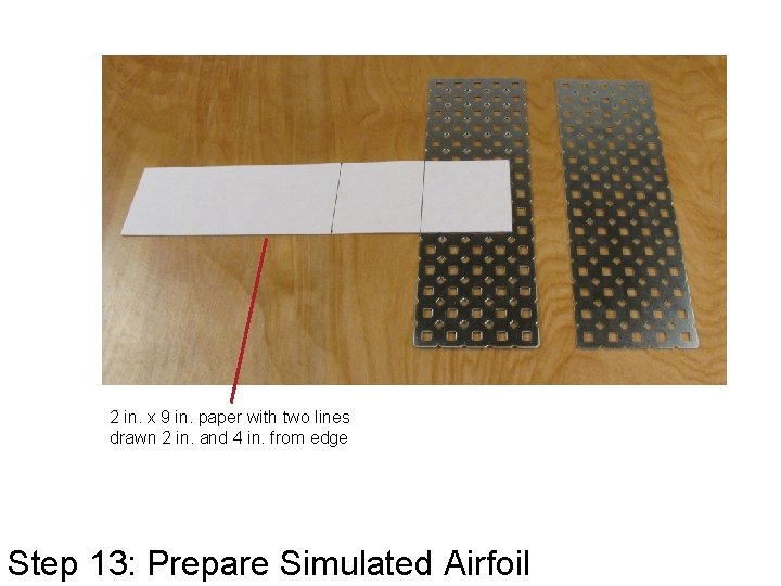 2 in. x 9 in. paper with two lines drawn 2 in. and 4