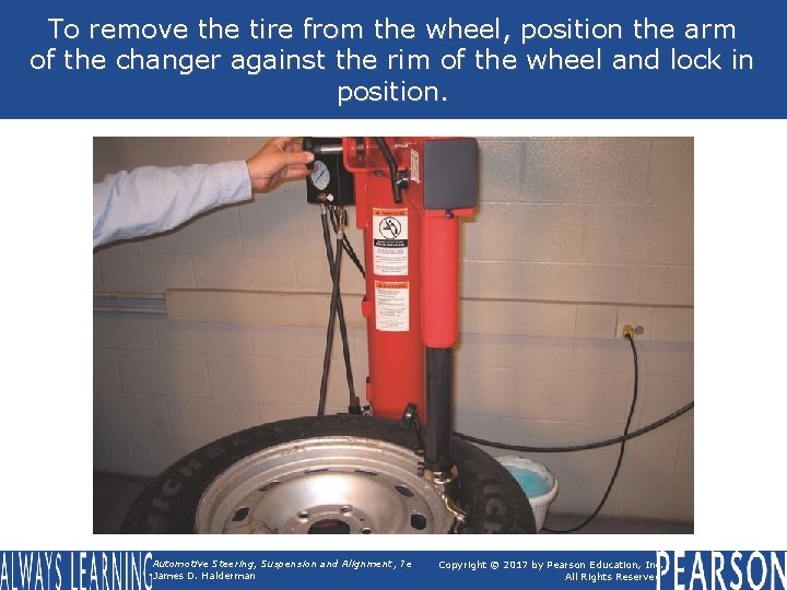 To remove the tire from the wheel, position the arm of the changer against