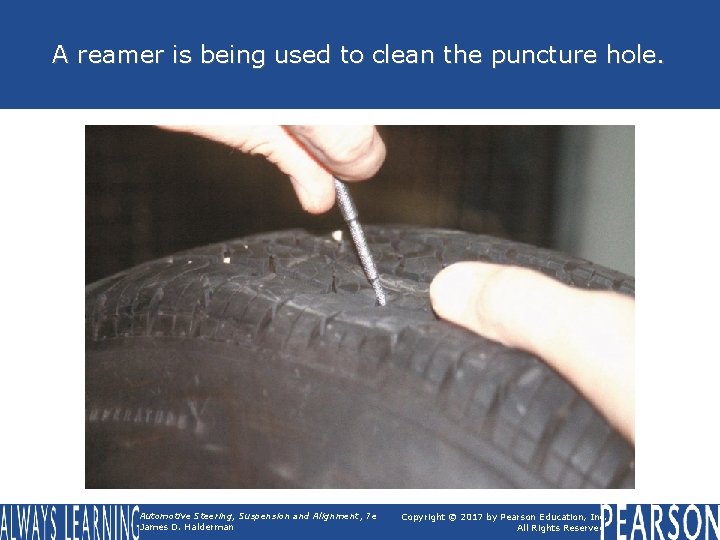 A reamer is being used to clean the puncture hole. Automotive Steering, Suspension and