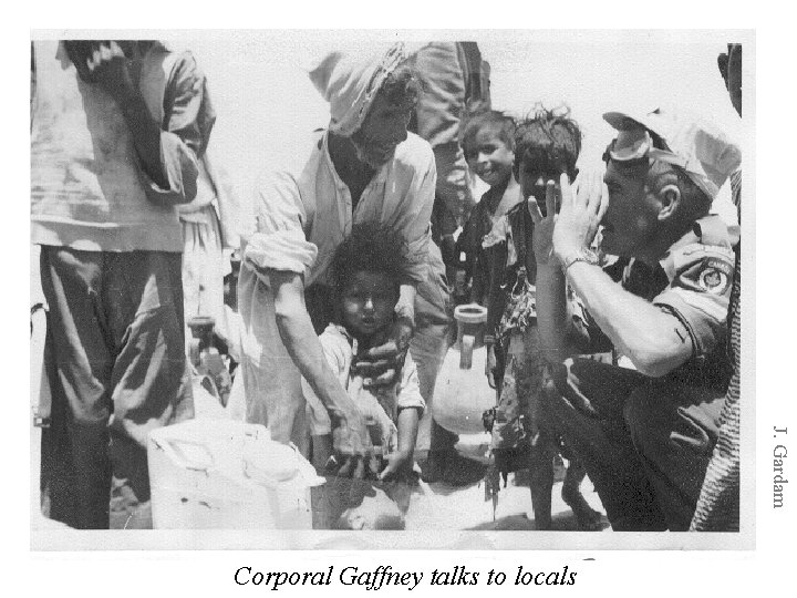 J. Gardam Corporal Gaffney talks to locals 