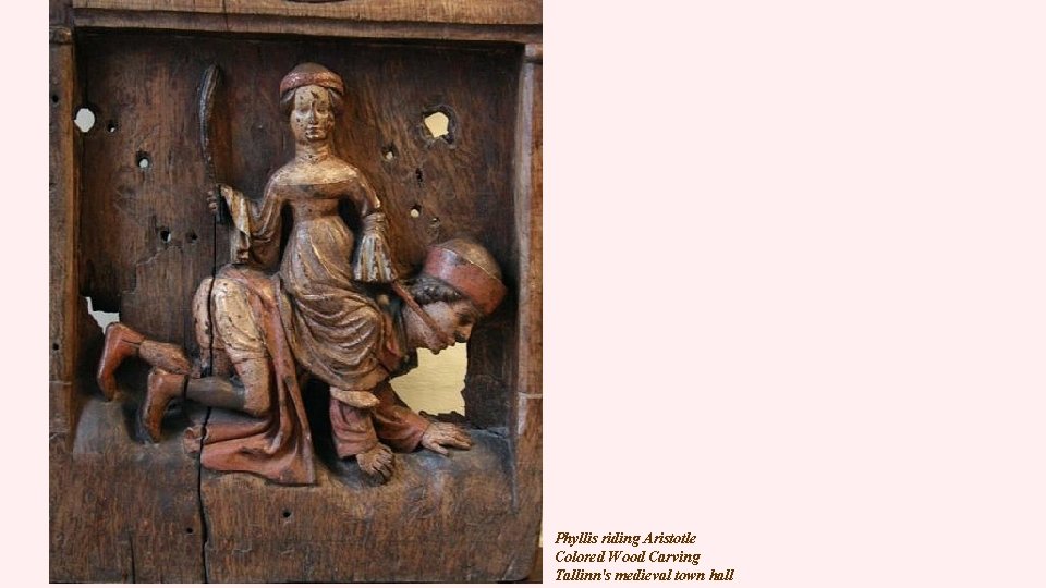 Phyllis riding Aristotle Colored Wood Carving Tallinn's medieval town hall 