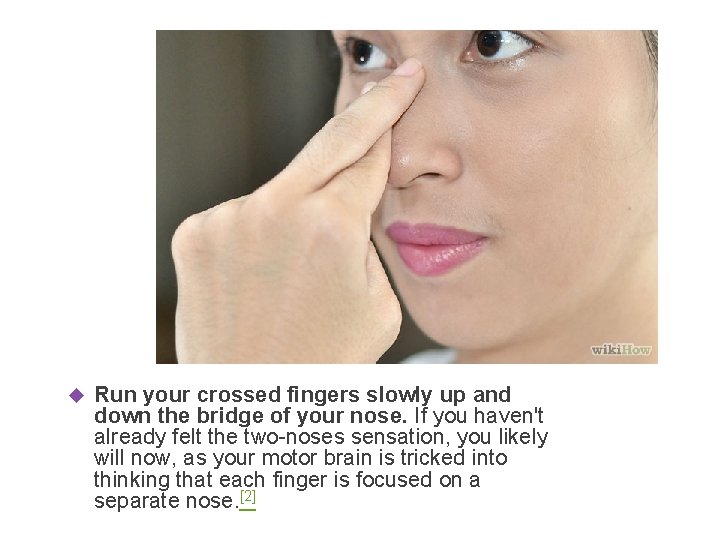  Run your crossed fingers slowly up and down the bridge of your nose.