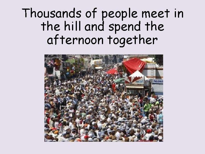 Thousands of people meet in the hill and spend the afternoon together 