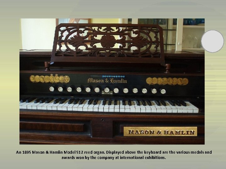 An 1895 Mason & Hamlin Model 512 reed organ. Displayed above the keyboard are